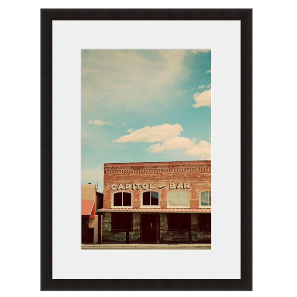 Image shown in Black Onyx frame with white mat