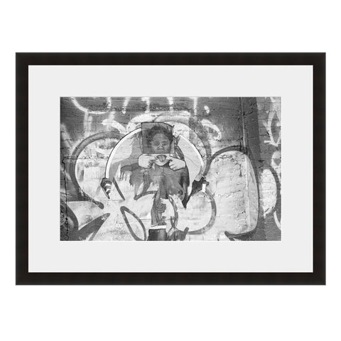 Image shown in Black Onyx frame with white mat