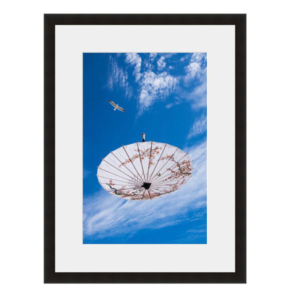 Image shown in Black Onyx frame with white mat